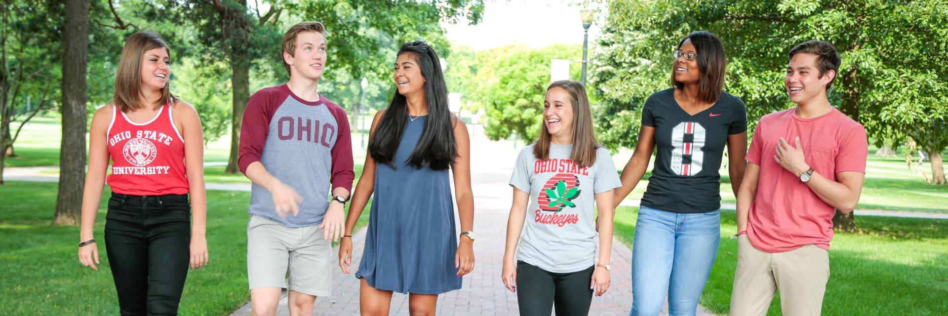 Students talking on oval