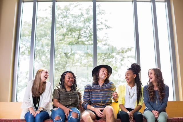 Students sitting on a bench