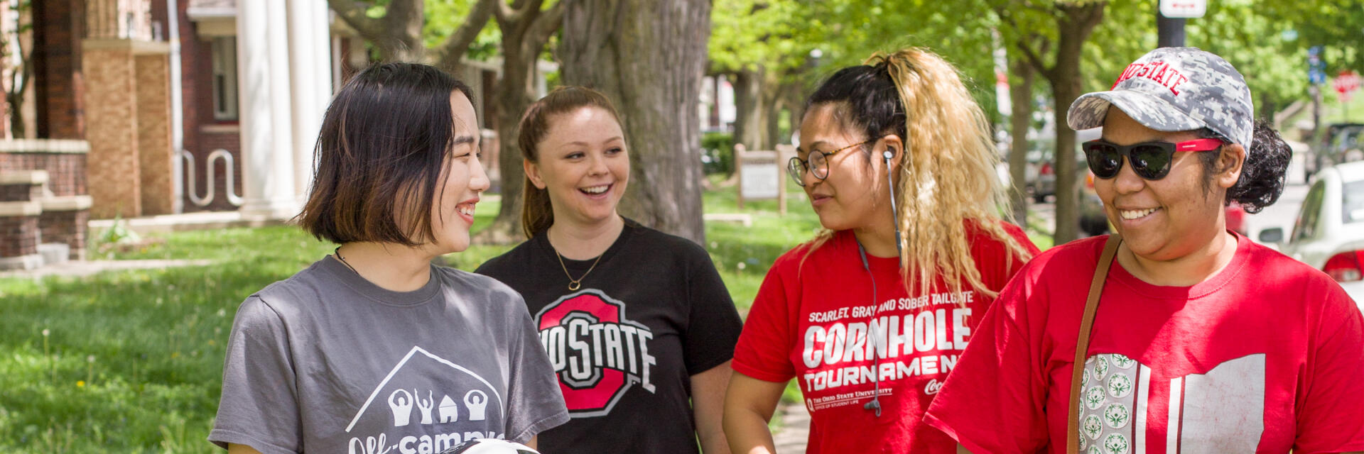 Students supporting each other walking on campus